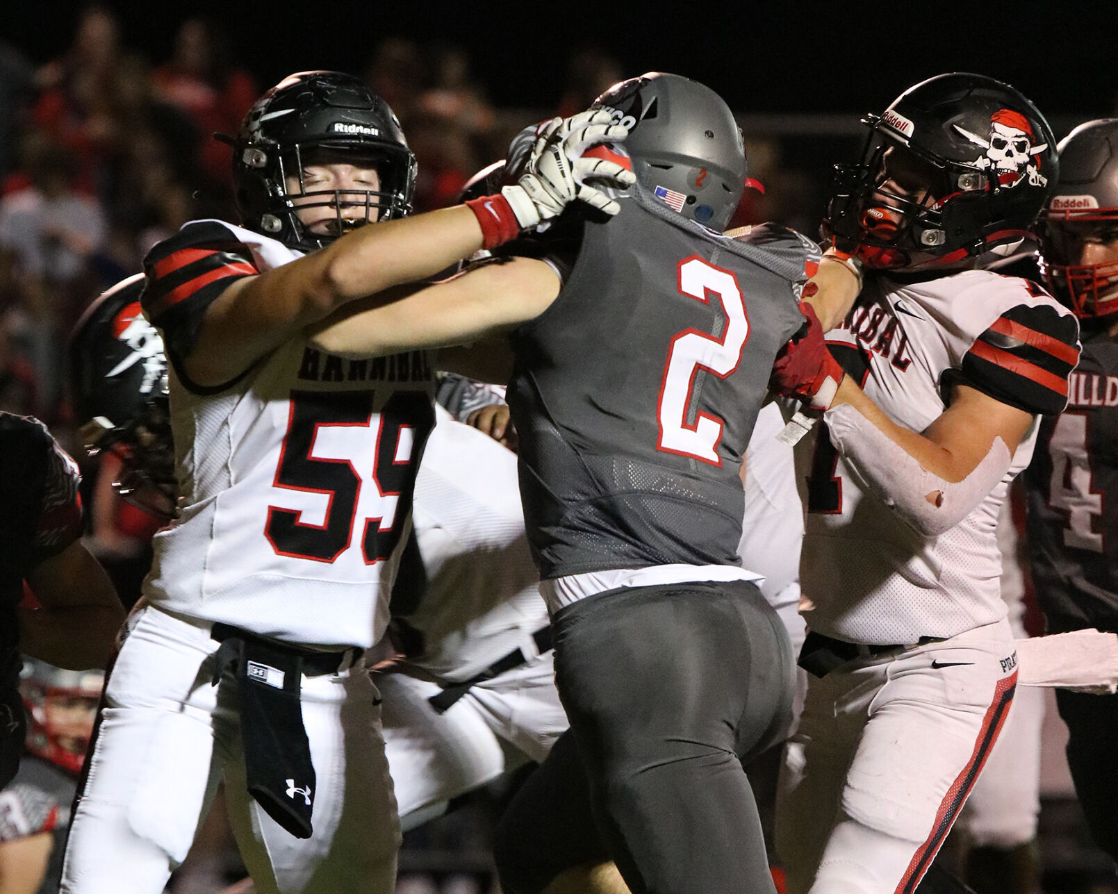 Conor Johnson blocks Noah Young at Mexico High School